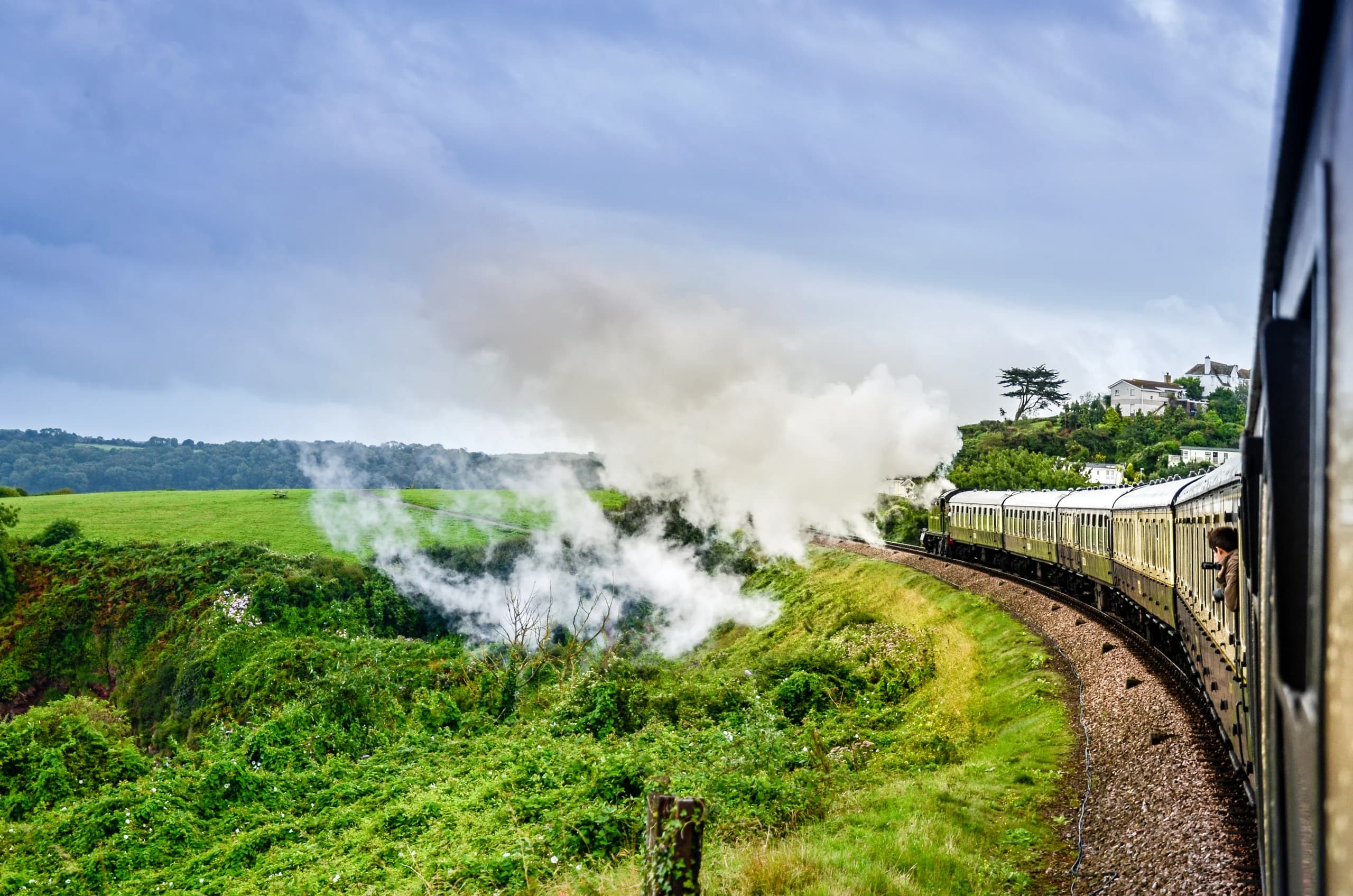 Steam train on the coast line above Goodrington