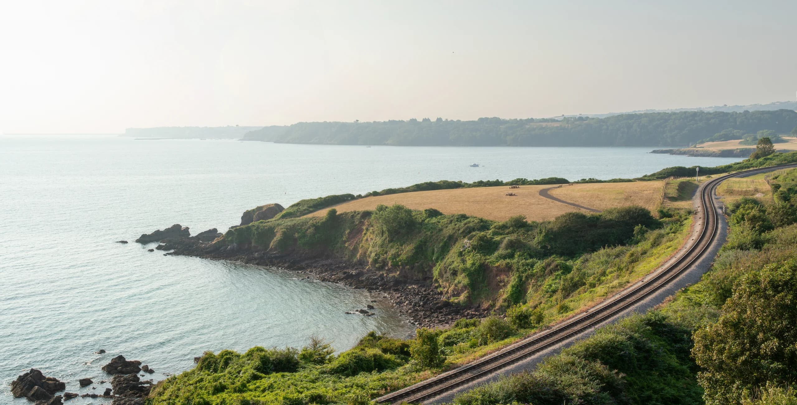 The railway curving along the cliffs towards Churston
